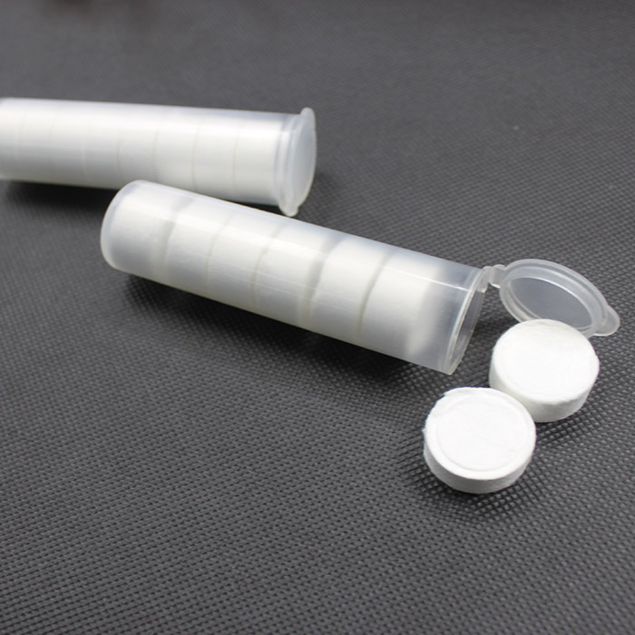 Pill nonwoven for travel compressed towel
