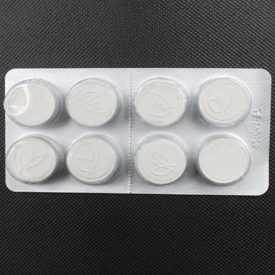 Tissue pill nonwoven for travel compressed towel