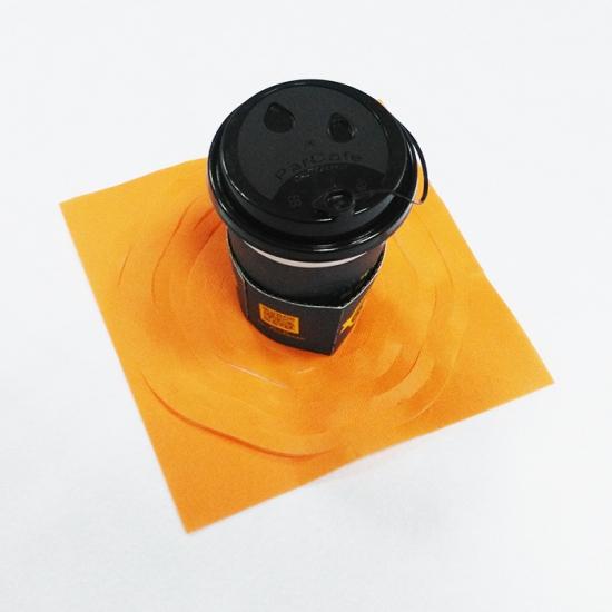 Folded non-woven coffee cup holder