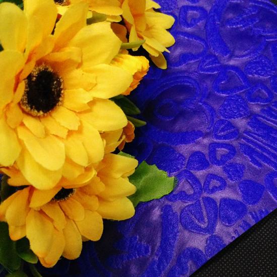 Nonwoven flower wrapping sheet