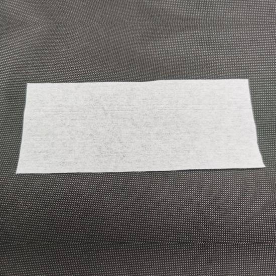Non woven absorbent pad